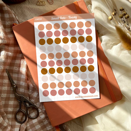 Small circle stickers in cream, peach, pink and brown colours
